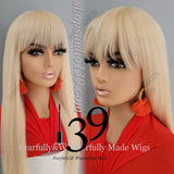 Platinum blonde long human hair wig with bangs perfect for all skin tones